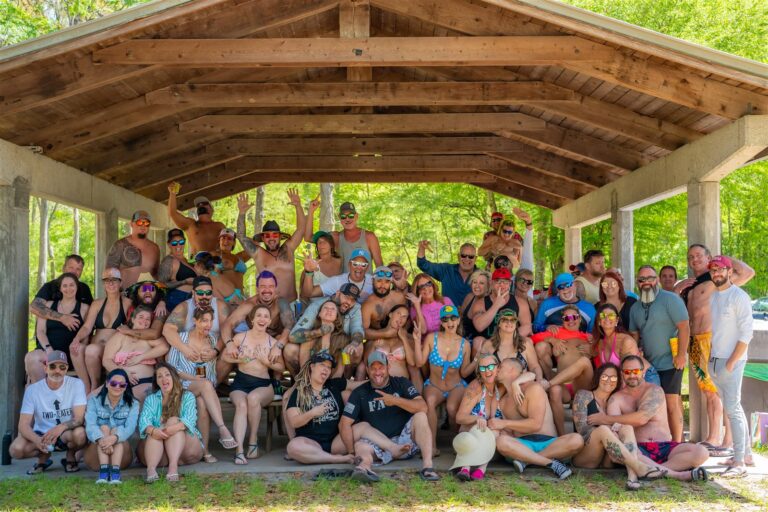 The whole camping group under the pavilion