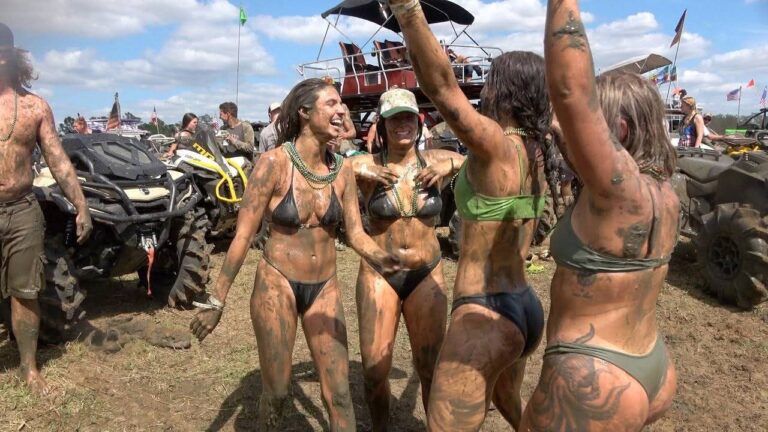 Mud-covered bikini fun