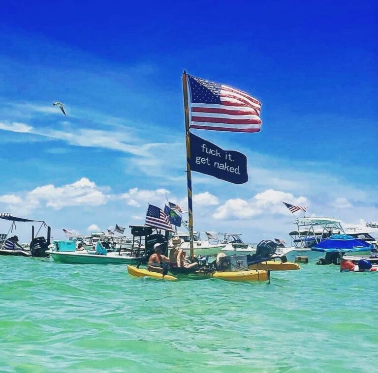 Flags flying at the sandbar