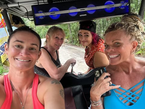 Golf cart crew at camp