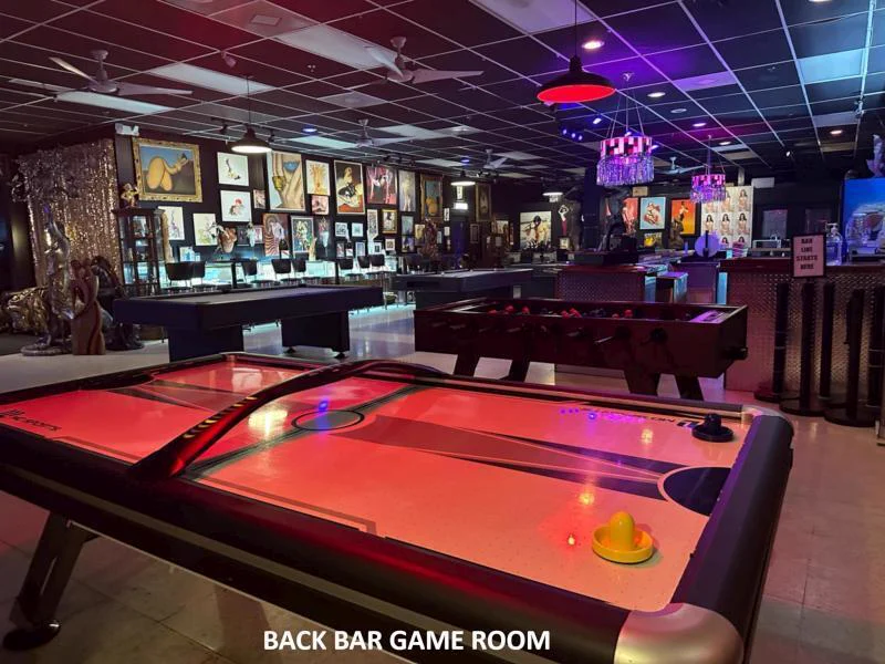 The back bar game room at Eyz Wide Shut
