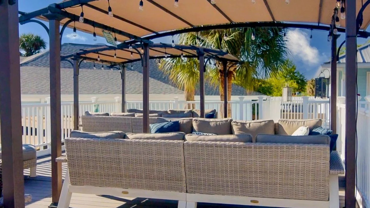 The covered lounge deck at Paradise Lakes Resort