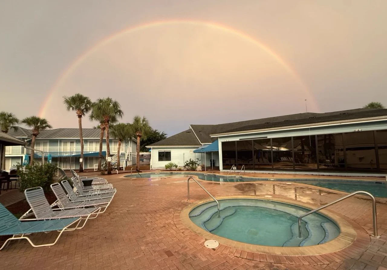 Rainbow over the pool at Paradise Lakes Resort