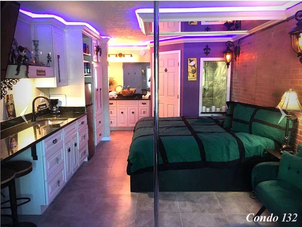 A condo with kitchen and lounge at Secrets Hideaway